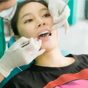 lấy cao răng bằng máy siêu âm